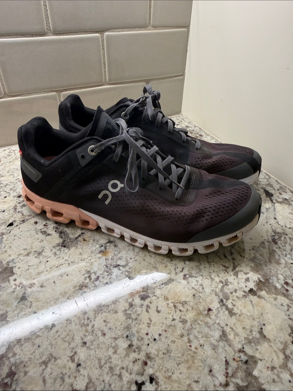 On Running Women's Cloud Waterproof Trainers - Black with Pink Sole wide size 9